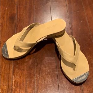 Jimmy Choo nude patent leather thong sandals